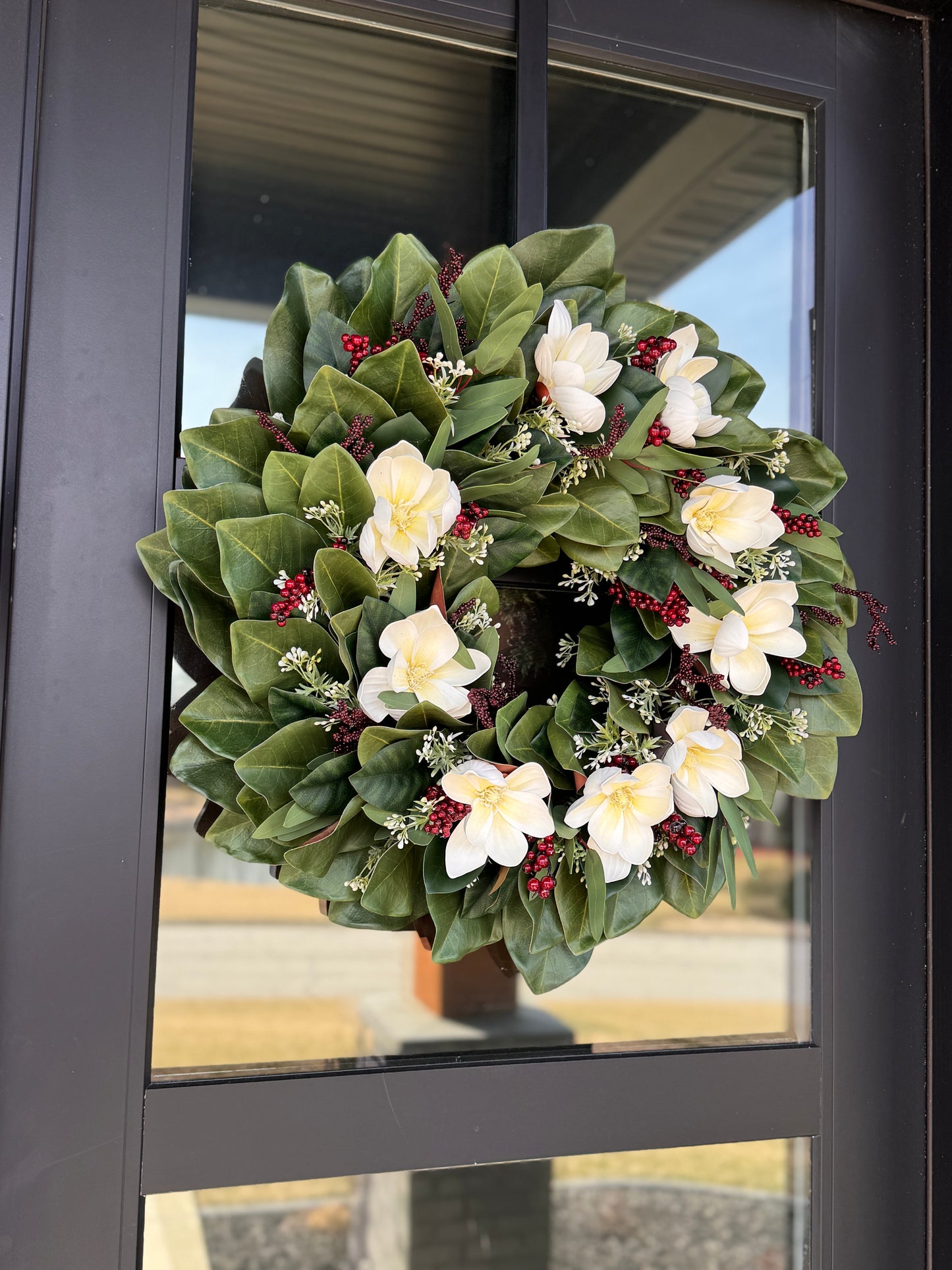 The Aurora Borealis - Winterberry and White Holly on Magnolia